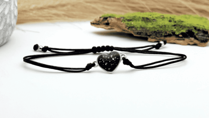 Bransoletka serce czarne z płatkami srebra (srebro 925)